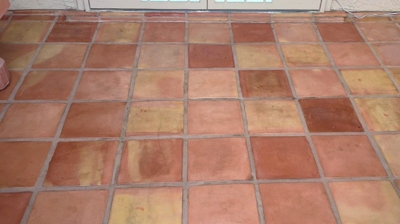 This AFTER image shows the cleaned and sealed Saltillo. Photo