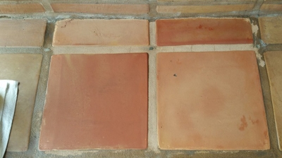 This image shows the sample tiles sealed with color-enhancing sealer. Photo