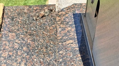 This BEFORE image offers a birds eye view of the break, as well as the unsightly countertop seam. Photo