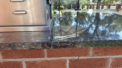 Honing and polishing helped blend the finish of the repair site with the rest of the top. Photo