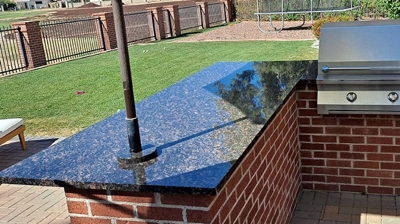 AFTER granite seam and break repair, honing, and polishing, we applied a sealer. Looks fantastic! Photo