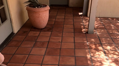 Notice how warm and welcoming the Saltillo entrance is AFTER our restoration services. Photo