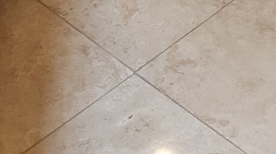 This AFTER image shows how clean and fresh the grout lines look because of our travertine services. Photo