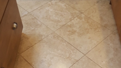 This image was taken BEFORE refinishing. Notice how dull the travertine looks. Photo