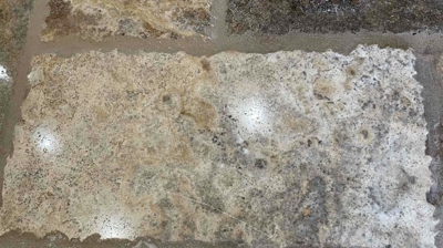 Before image of travertine floor. Photo