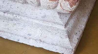 We used tinted epoxy to secure the broken cantera corner piece back in place. Photo