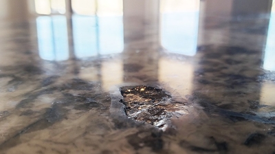 Here is another BEFORE image. The granite countertop chips were very noticeable. Photo