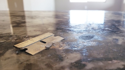 This image was taken DURING the repair process, after the chip had been filled, but before the repaired area had been refinished Photo