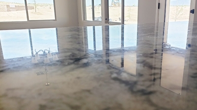 This AFTER image shows the granite repair site refinished and blending nicely with the surrounding area. Photo