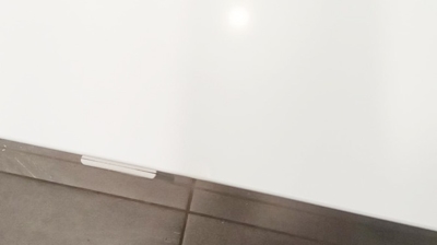 This AFTER image shows a birds-eye-view of the repaired countertop Photo