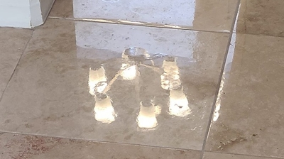 Notice the clarity of the reflection of the light fixture in this AFTER image. Photo