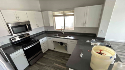 Here are the kitchen countertops BEFORE restoration. Photo