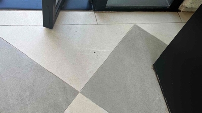 The entry way looks much better without the unsightly rust stain. Photo