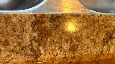 This image provides a closer look at the precision repair. Photo