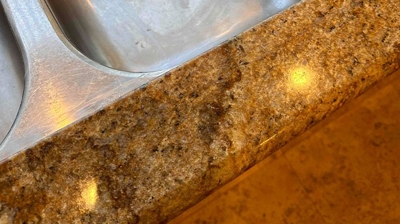 Notice the reflection of the overhead lights on the restored finish. Photo