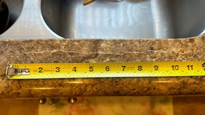 Here is the crack in granite countertop along the edge of the sink. Photo