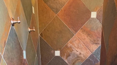 Our slate shower restoration services made a dramatic difference, as you can see in this AFTER image. Photo