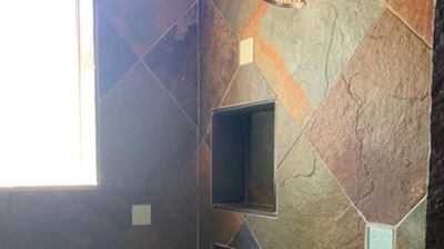 Here is another AFTER image of the refinished slate shower walls. Photo
