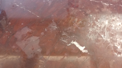 This close up image of the marble finish demonstrates the severe etching. Photo