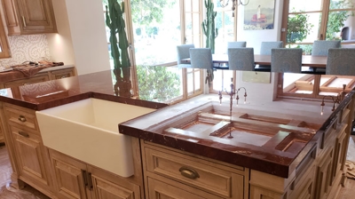 This is the same marble island countertop after our restoration services and StoneGuard application. What a difference! Photo