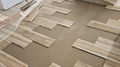 Here is the floor after the flowable underlayment had been poured and cured. Photo