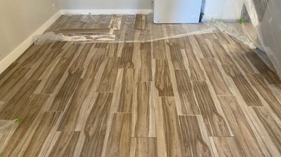 This image shows the kitchen floor AFTER we replaced the tiles. Photo