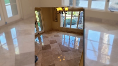 Notice the glass-like  travertine finish in this AFTER image. Photo