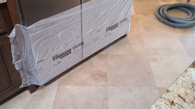 We masked and protected the refrigerator. Photo