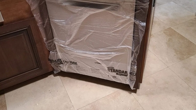 We masked and protected the dishwasher. Photo