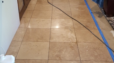 Here is the floor before our travertine restoration work. Photo