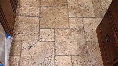 As you can see in this BEFORE image, this travertine floor has a dark and dirty appearance. Photo