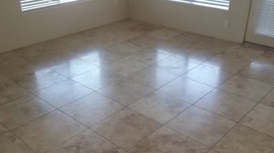 In this BEFORE image, notice the cloudy reflection of the light coming in the windows. Photo