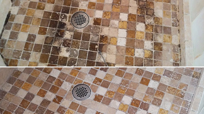 This is the travertine shower pan BEFORE (top) and AFTER (bottom) our restoration services. Photo