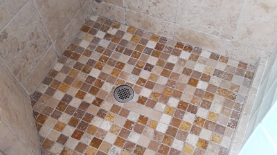 Notice the dramatic difference our travertine cleaning made. Photo