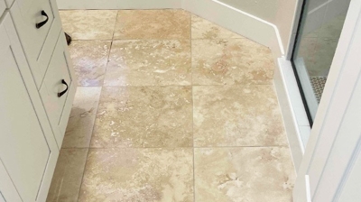 The travertine in the kitchen, although clean, had little reflectivity. Photo