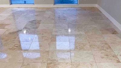 In this AFTER image, the reflection of the polished travertine is apparent. Photo