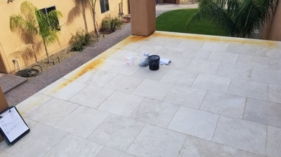 In this BEFORE image you can see the rust stains on the travertine. Photo