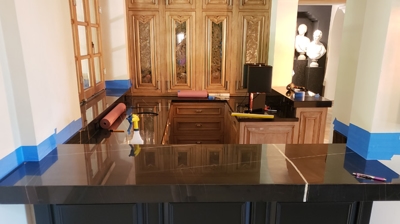 Here is the dull-looking black marble top before the StoneGuard® application. Photo