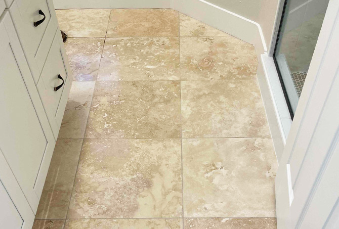 The travertine in the kitchen, although clean, had little reflectivity.