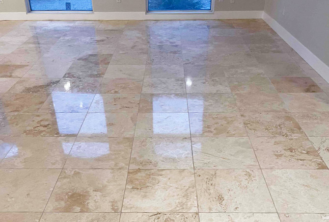 The reflection of the polished travertine demonstrates the difference our services make.