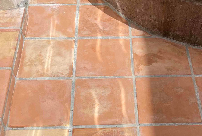 The tiles around the base of fountain look clean, fresh, and inviting AFTER restoration.