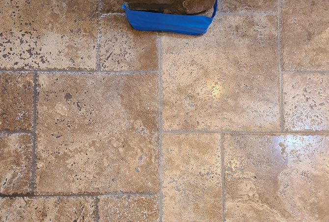 The left side of the image shows a portion of the floor that has not yet been cleaned. The right side shows the clean floor. The difference between the left and right is noteworthy.