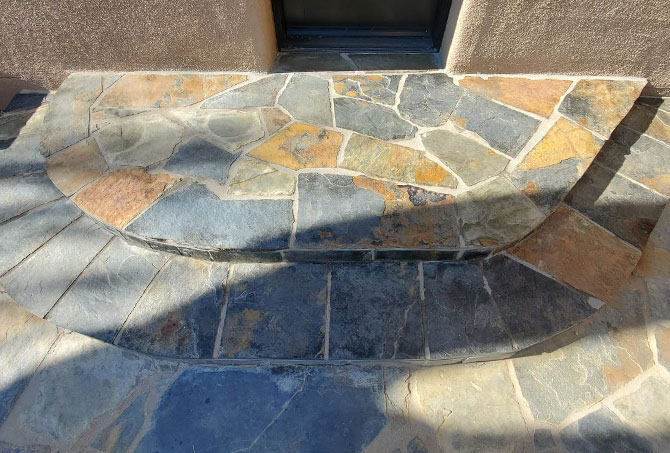 This side entrance looks welcoming after our flagstone restoration services.