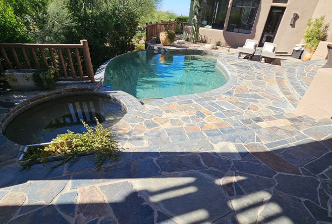 This gorgeous flagstone pool and patio area needed a little professional attention.