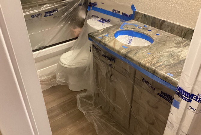 We protected the surfaces surrounding our work area in the guest bathroom.