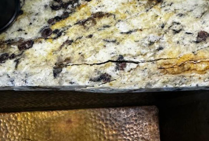 The granite crack splintered off into several sections.